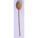 AN ANTIQUE YELLOW METAL TIE PIN. 5 grams. 7.5 cm long.