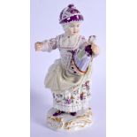 Meissen crinoline figure of a girl holding a doll, crossed swords in blue. 14.5cm high