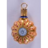 A MINIATURE 19TH CENTURY FRENCH PORCELAIN SCENT BOTTLE. 3.5 cm x 2.5 cm.