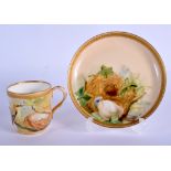 Royal Worcester fine coffee cup and saucer painted with birds and their nests by David Bates, dated