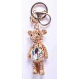 A LARGE GEM SET TEDDY BEAR KEYRING. Bear 6 cm high.