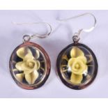 A PAIR OF SILVER FLOWER EARRINGS. 2 cm long.