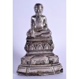AN EARLY SOUTH EAST ASIAN SILVER OVERLAID FIGURE OF A BUDDHA probably Burmese or Thai. 254 grams ove