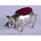 A SILVER PIG PIN CUSHION. 4 cm x 1.5 cm.