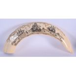 A LARGE CONTINENTAL SCRIMSHAW STYLE CARVING decorated with whaling scenes. 36 cm wide.