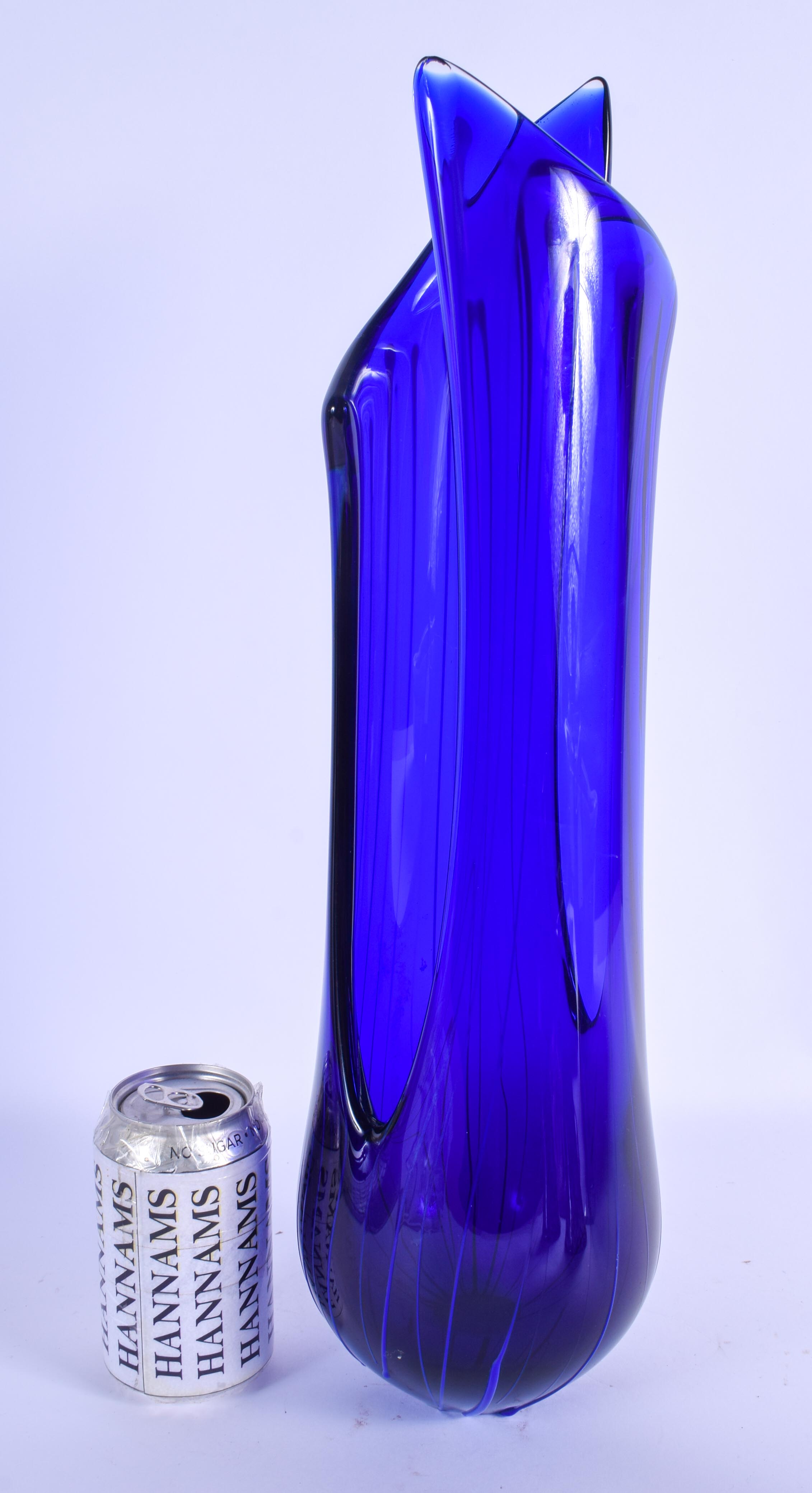 A STYLISH LARGE EUROPEAN RETRO BLUE GLASS VASE with overlaid decoration. 46 cm high.