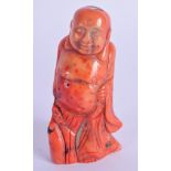 A 19TH CENTURY CHINESE CARVED CORAL FIGURE OF A BUDDHA. 7.5 cm high.