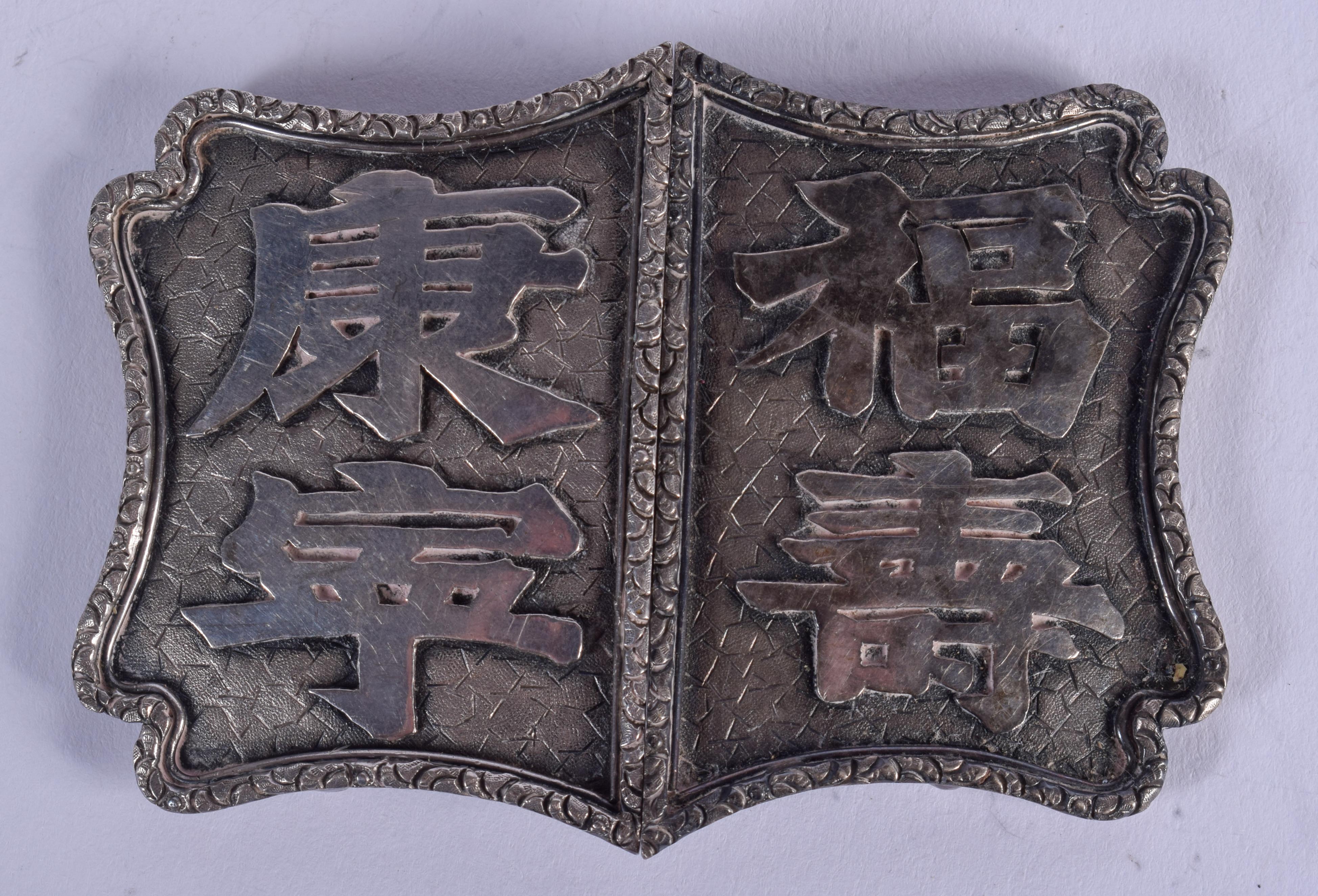 A 19TH CENTURY CHINESE EXPORT SILVER BUCKLE. 39 grams. 10 cm x 6 cm.