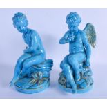 A PAIR OF 19TH CENTURY EUROPEAN BLUE GLAZED PUTTI Minton or Sevres. 24 cm high.
