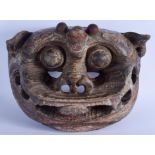 A RARE LARGE 17TH/18TH CENTURY POLYCHROMED WOOD TIBETAN RITUAL MASK modelled scowling with muted pai