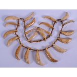 A POLYNESIAN TRIBAL SHELL NECKLACE. 76 cm long.