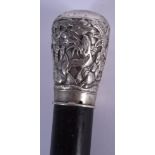 A 19TH CENTURY INDIAN SILVER MOUNTED EBONY WALKING CANE decorated with Buddhistic figures. 90 cm lon