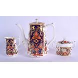 Royal Crown Derby coffee set painted with an imari pattern, coffee pot and cover, sucrier and cover