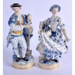 A PAIR OF 19TH CENTURY MEISSEN BLUE AND WHITE FIGURES. 21 cm high.