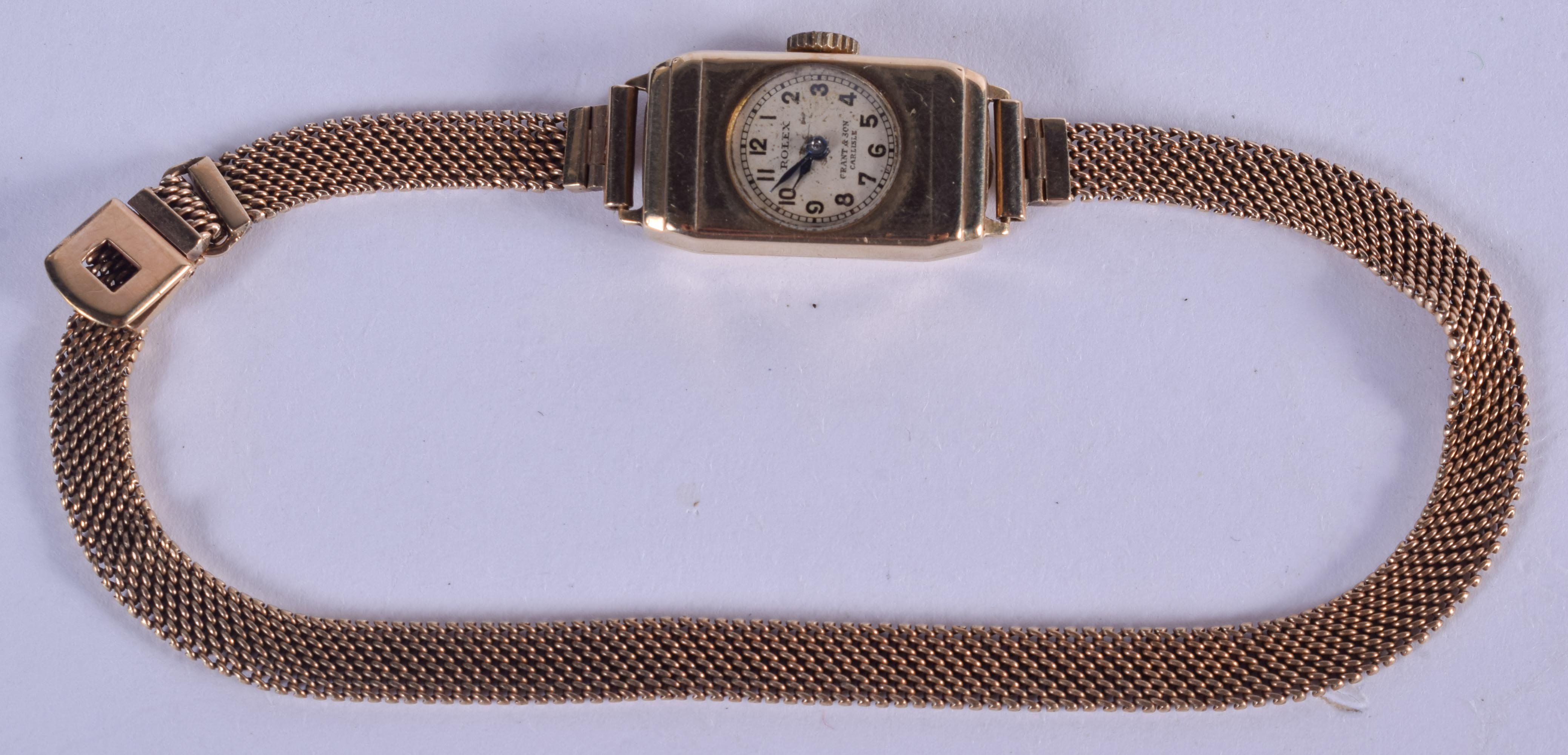 A VINTAGE 9CT GOLD ROLEX WRISTWATCH with 9ct gold strap. 15 grams overall. Dial 1.25 cm x 2.25 cm.