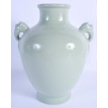 A CHINESE CELADON TWIN HANDLED PORCELAIN VASE bearing Qianlong marks to base. 24 cm x 14 cm.