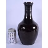 A 19TH CENTURY CHINESE BLACK BROWN GLAZED STONEWARE VASE Qing. 35 cm high.