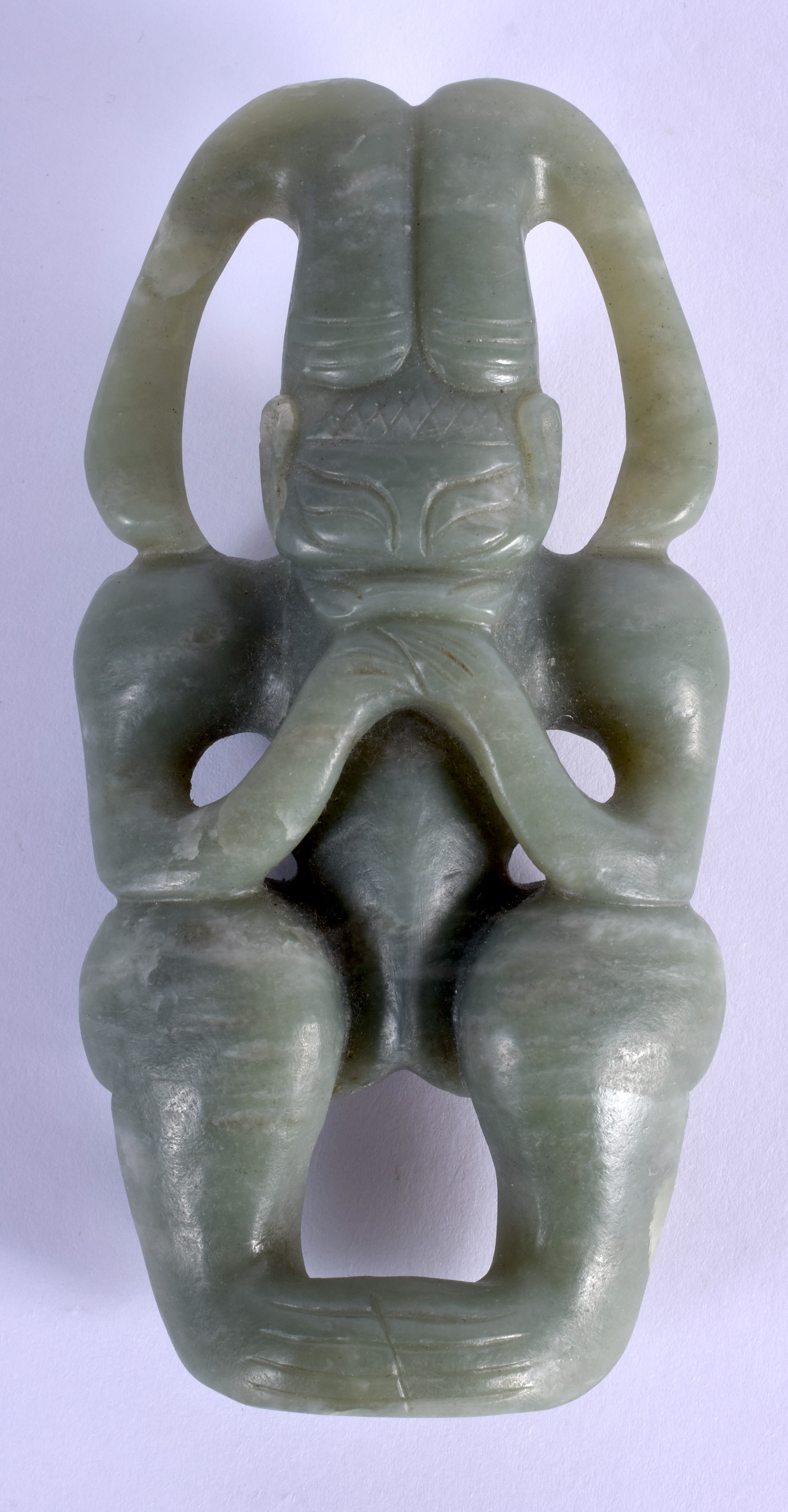 A CHINESE CARVED HONGSHAN CULTURE CARVED JADE FIGURE OF A SUN GOD possibly Neolithic period. 12 cm x
