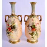 Royal Worcester fine pair of two handled blush ivory vases painted with thistles in the style of Edw