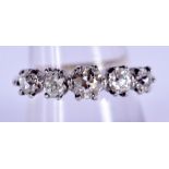 AN ANTIQUE GOLD AND FIVE STONE DIAMOND RING of approx 1.4 cts. 3.3 grams. Q/R.
