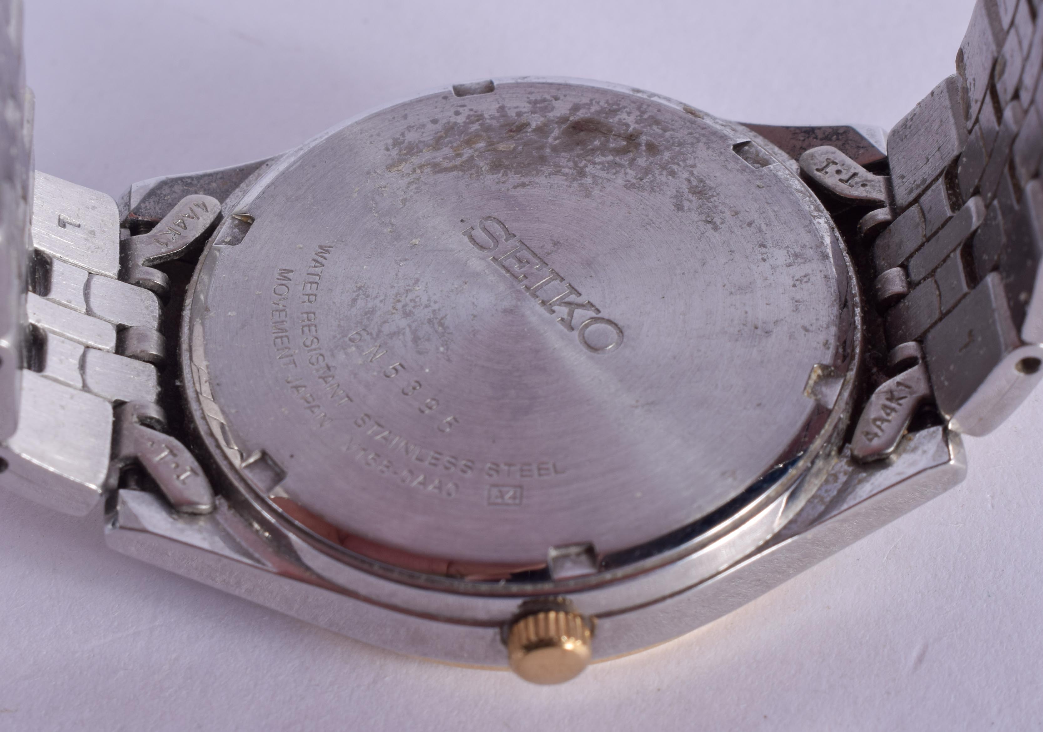 A SEIKO SOLAR TWO TONE WRISTWATCH. 3.5 cm diameter. - Image 2 of 2