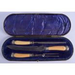 AN ANTIQUE HUNTING CARVING SET. (3)