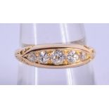 AN 18CT GOLD AND DIAMOND RING. P. 4.3 grams.