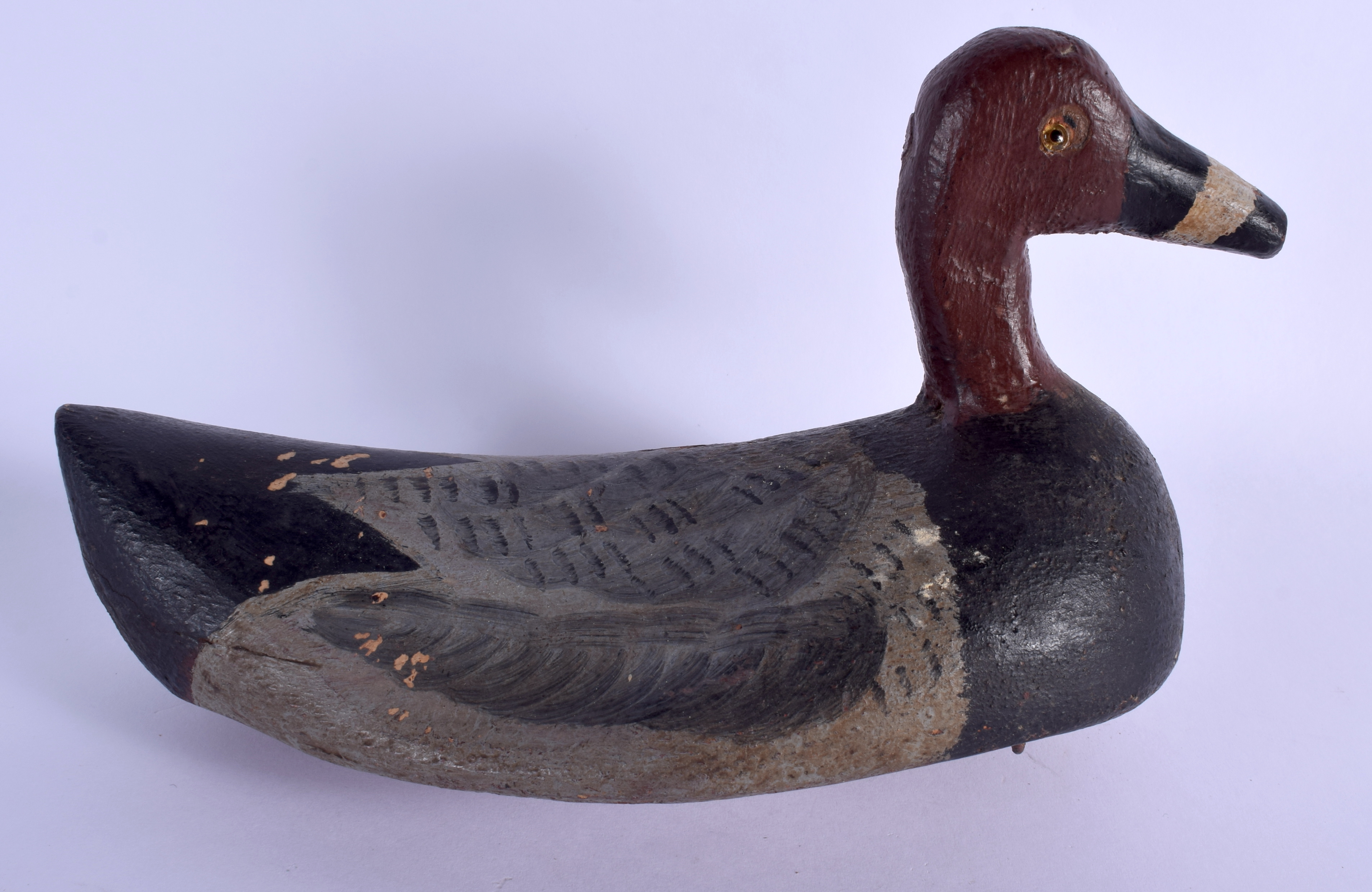 A VINTAGE PAINTED DECOY DUCK. 20 cm x 12 cm.