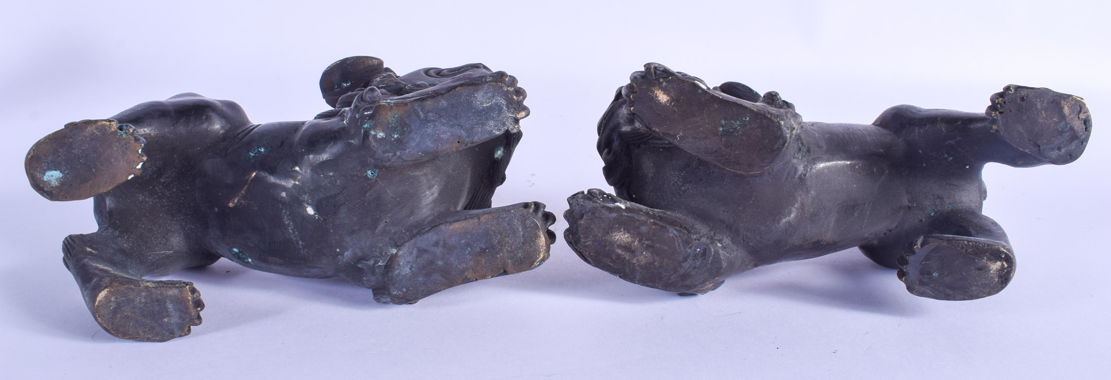 A PAIR OF CHINESE BRONZE BUDDHISTIC DOGS OF FOE 20th Century. 16 cm x 11 cm. - Image 3 of 3