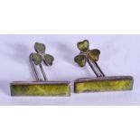 A VINTAGE PAIR OF IRISH ENAMELLED SHAMROCK CUFFLINKS. 2.75 cm wide.