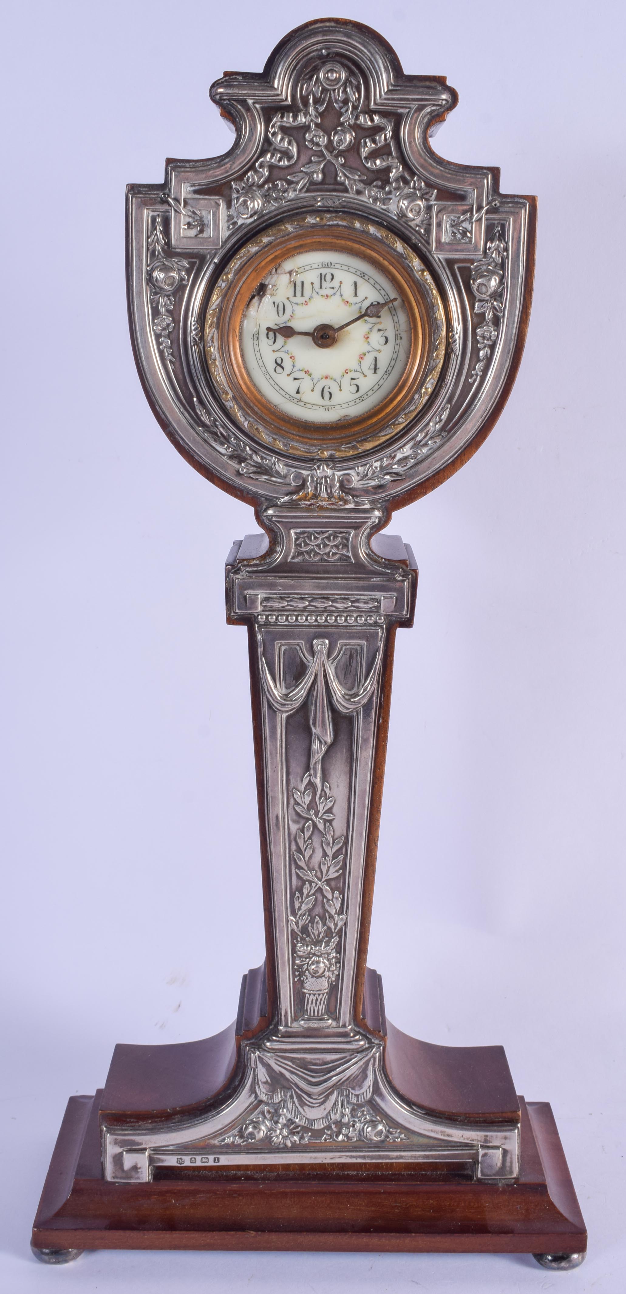 A LARGE ART NOUVEAU SILVER MOUNTED MAHOGANY MANTEL CLOCK embellished with flowers. Birmingham 1910.