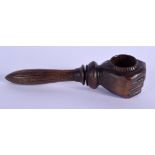 AN UNUSUAL ANTIQUE BAVARIAN BLACK FOREST FIST NUT CRACKER. 21 cm long.