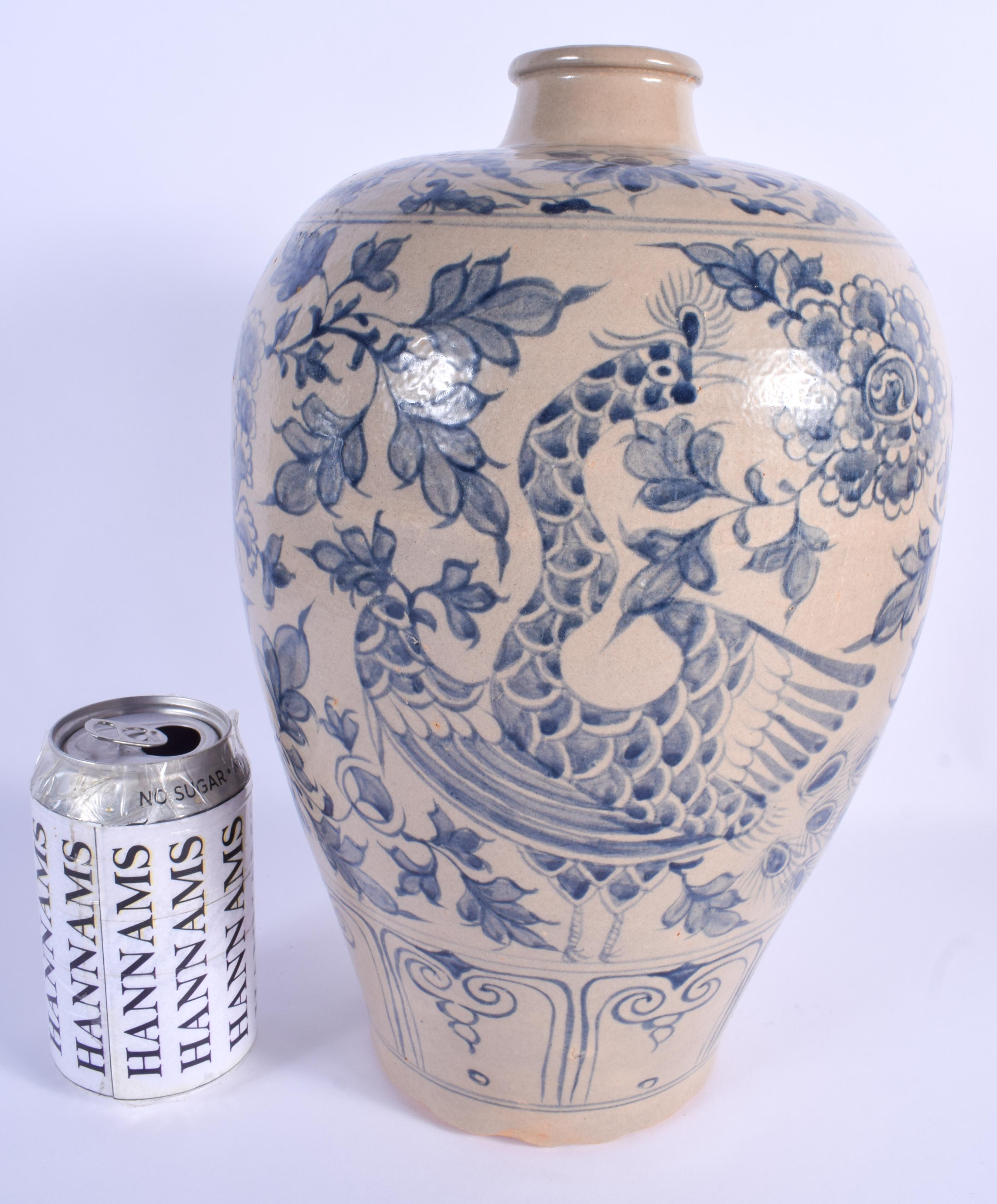 AN ANTIQUE VIETNAMESE STONEWARE POTTERY VASE painted with birds and flowers. 33 cm x 15 cm. Provenan