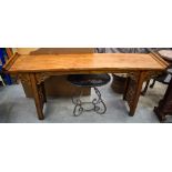 A LARGE 19TH CENTURY CHINESE PROVINCIAL CARVED LIGHT ELM ALTAR TABLE modelled in the Ming style, for
