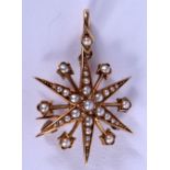 A VICTORIAN 15CT GOLD PEARL SUNBURST BROOCH. 4.8 grams. 2.75 cm wide.