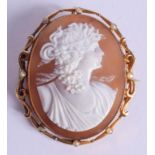 AN ANTIQUE 9CT GOLD MOUNTED CAMEO BROOCH. 11.3 grams. 3.5 cm x 4 cm.