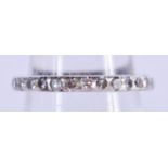 A GOLD AND DIAMOND ETERNITY RING. 2.2 grams. J/K.