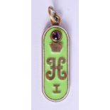 A CONTINENTAL SILVER AND ENAMEL PENDANT. 5 cm x 1.5 cm.