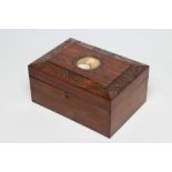 A REGENCY SEWING BOX, early 19th century, of oblong form veneered in Kingwood, the canted domed