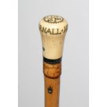 A GENTLEMAN'S CANE, late 17th/early 18th century, the polished ivory pommel with picque