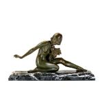 AFTER ARMAND GODARD - an Art Deco bronze figure modelled as a young female nude kneeling on her