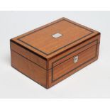 AN EARLY VICTORIAN SATINWOOD SEWING BOX of oblong form banded in rosewood, hinged lid with inset
