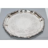 A LATE VICTORIAN SILVER SALVER, maker's mark WA, Chester 1901, of shaped circular form, the pie-