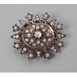 AN EARLY VICTORIAN DIAMOND BROOCH/PENDANT, the central cluster within an open border of old mixed