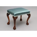 A GEORGIAN DESIGNED BEECH DRESSING STOOL, c.1909, of oblong form upholstered in fringed turquoise