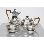 A SILVER FOUR PIECE TEA SERVICE, maker C.S. Harris & Sons Ltd., London 1919 (milk and sugar) and