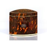 A REGENCY TORTOISESHELL SMALL TEA CADDY of navette form, strung with ivory and with applied oval