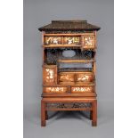 A JAPANESE SHIBIYAMA SHODHANA, Meiji period, the faux roof canopy over an arrangement of shelves,