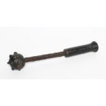 A FIRST WORLD WAR GERMAN TRENCH MACE with cast iron bulbous top and grip with flexible wire shaft,