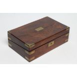 A ROSEWOOD AND BRASS MOUNTED CAMPAIGN WRITING BOX, early 19th century, the hinged lid inset with a